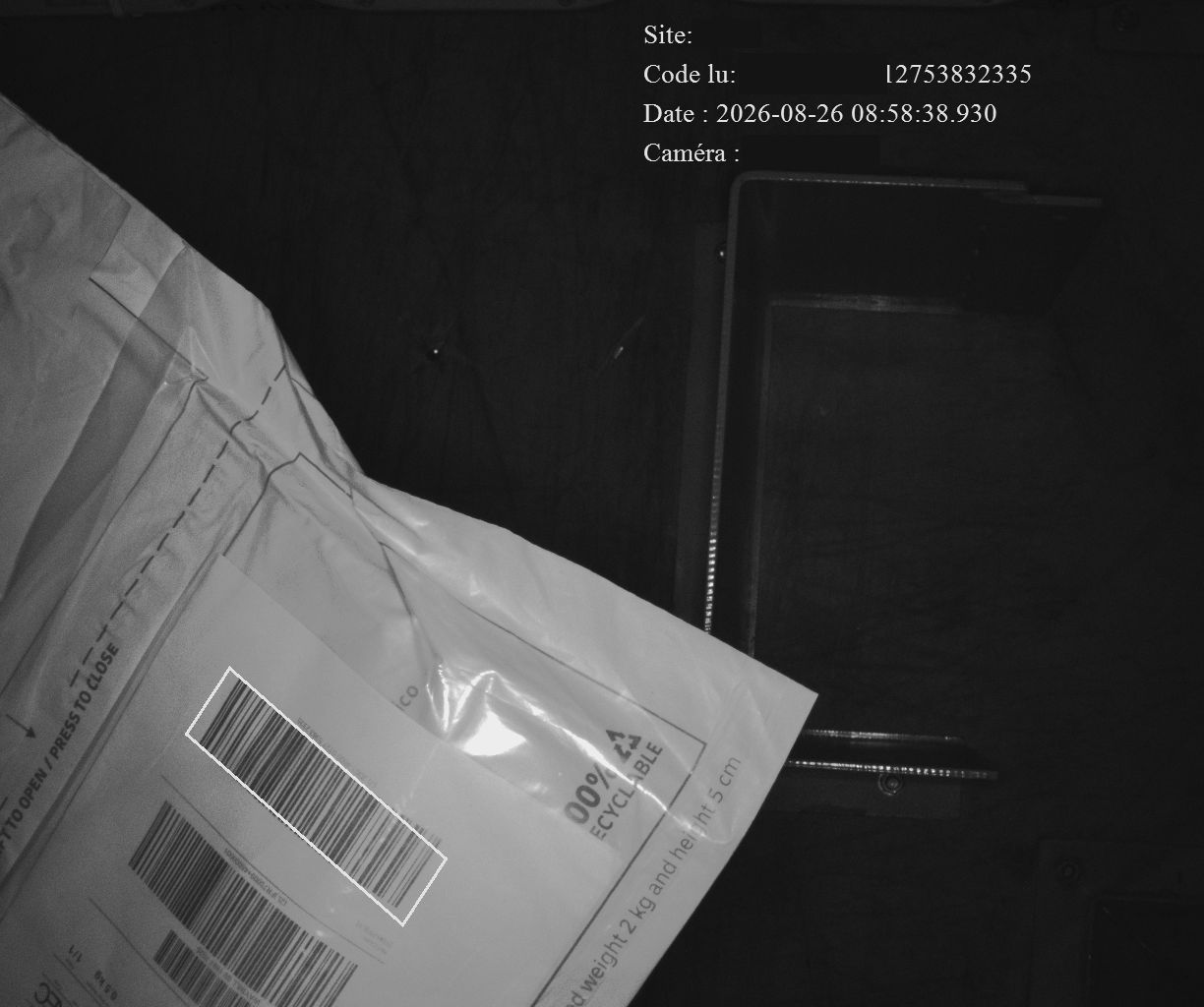 Output from a reading gantry: the barcode area is outlined on the parcel, with the code read, the timestamp and the source camera.